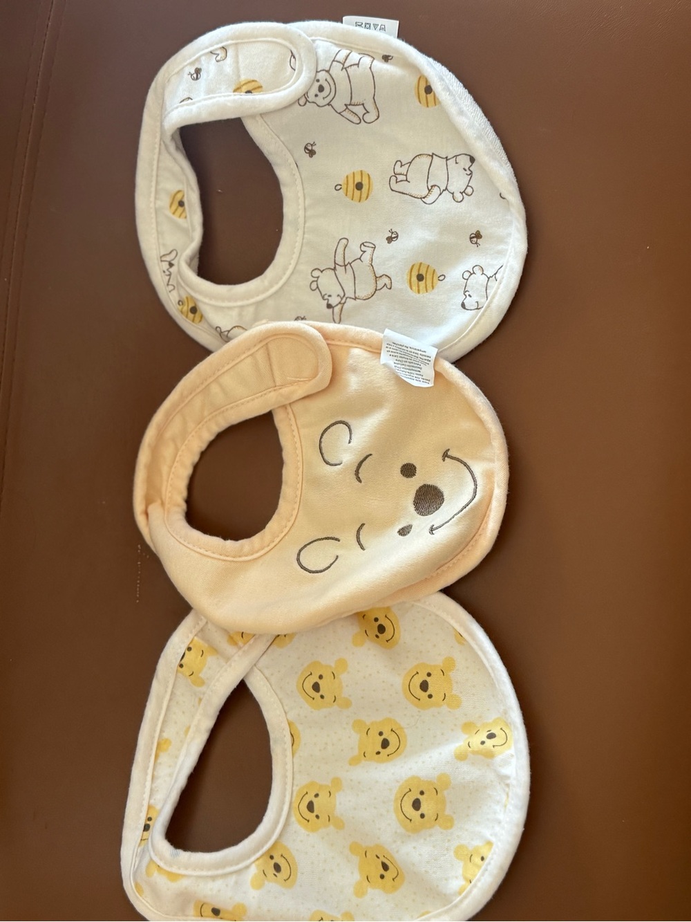 Disney Baby Bibs in Cream, Pale Yellow and White - Winnie the Pooh Set